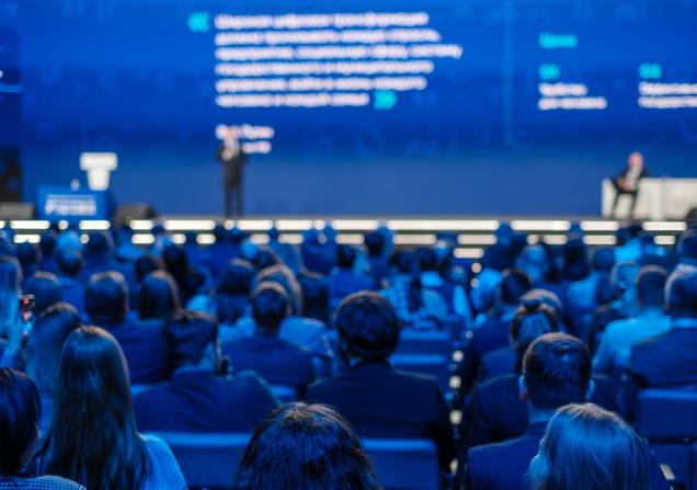 Back view of a crowd at an event. Image by Anton Gvozdikov via Shutterstock.