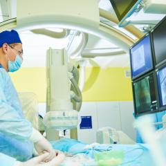 Image by Dmitry Kalinovsky via Shutterstock. A interventional radiologist at work. Image by Dmitry Kalinovsky via Shutterstock.