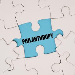 Image by My Stockers via Shutterstock. A white jigsaw with a missing piece - the word 'philanthropy' is written in the gap. Image by My Stockers via Shutterstock.